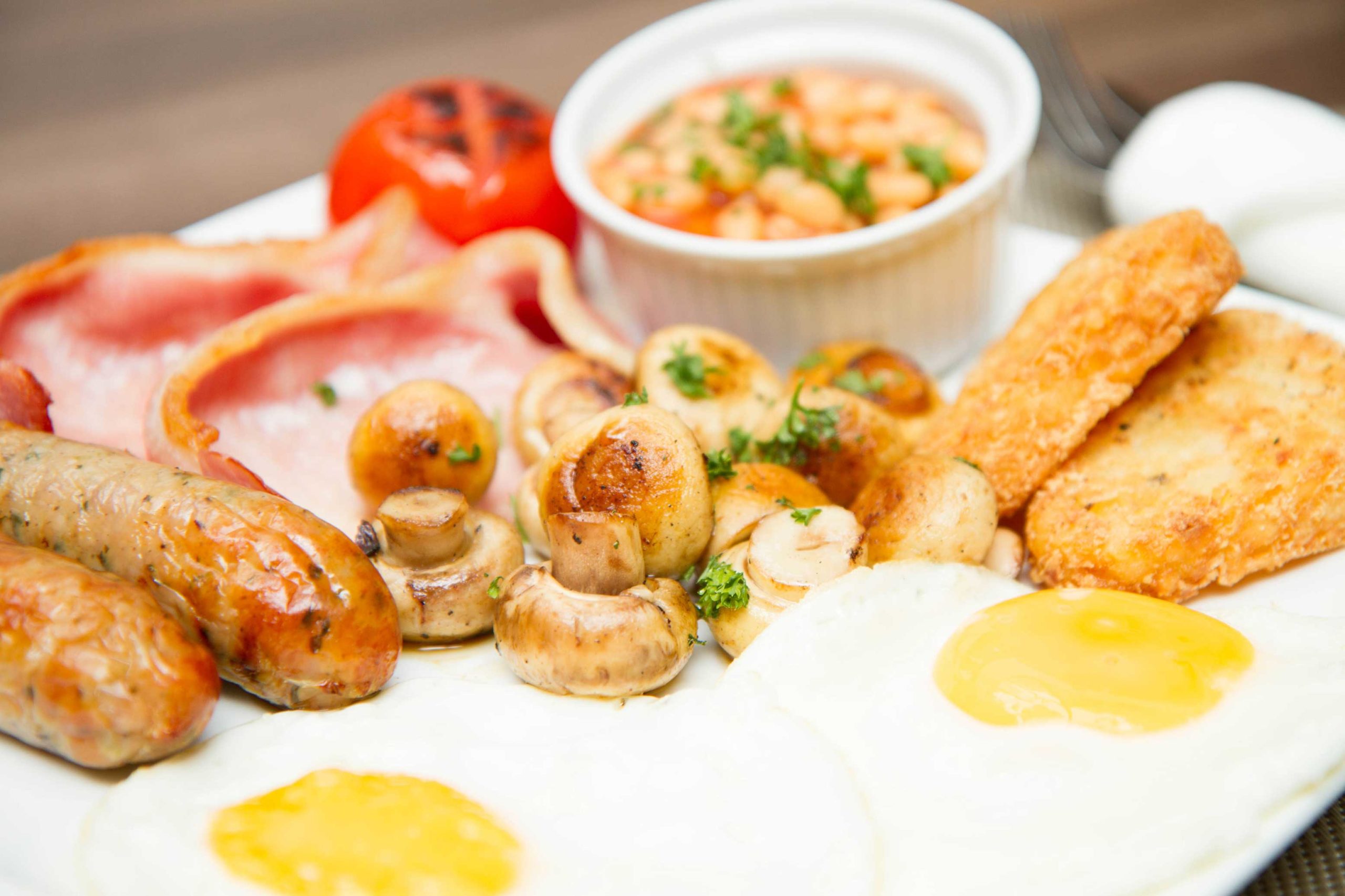 A breakfast plate with a full english breakfast