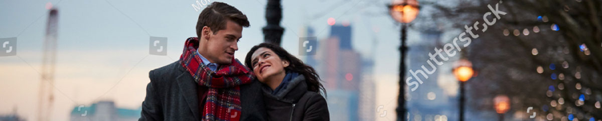 A woman gazes into the eyes of a man
